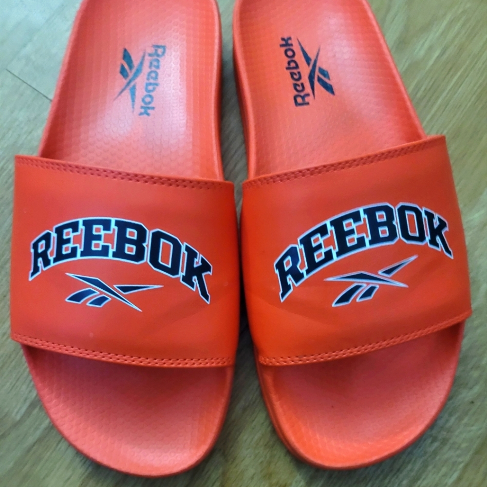 Reebok Orange. size 7 Slides/Sandals